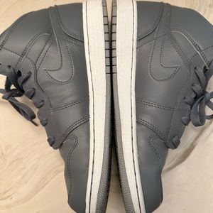 Air Jordan 1, gray size 7 boys, or women’s size 9.